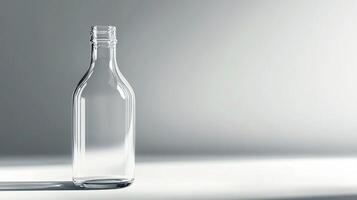 Elegant Beverage Bottle Captured in Studio with Gentle Shadows On Surface photo