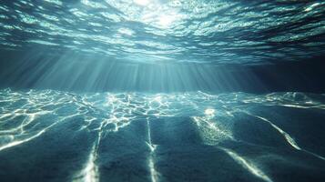 Tranquil Deep Blue Ocean Surface with Sparkling Sunlight and Rippling Effects photo