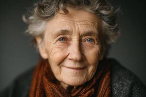 An older woman with a scarf on her head photo