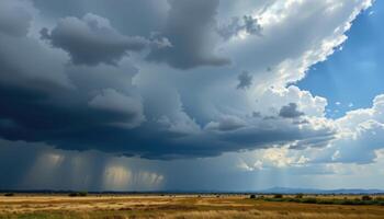dark clouds moving over a vast plain photo