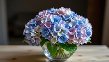a bouquet of hydrangeas in a glass bowl photo