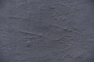 Light grey rough slate scratch background or texture. photo