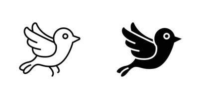 Two black and white birds with wings vector