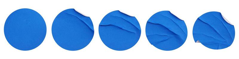 Set collection of blank blue paper stickers mock up in round shape isolated on white background photo