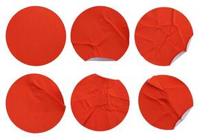 Set collection of blank red paper stickers mock up in round shape isolated on white background photo