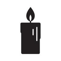 A black candle with a flame on it vector