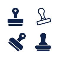 Collection of Four Dark Blue Rubber Stamps Isolated on White Background Different Styles and Angles Icons vector
