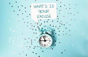 Clock with the words Whats your excuse written above it symbolizing time management and motivation photo