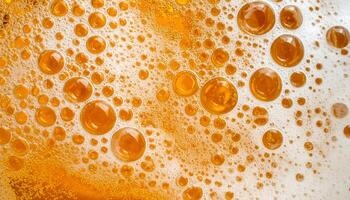 closeup macro texture of frothy golden beer surface with bubbles and foam abstract pattern for background use photo