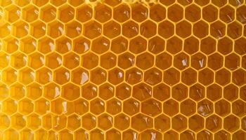 macro honeycomb texture filled with golden honey, hexagonal beeswax pattern, natural organic structure background photo