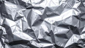 crinkled silver thermal foil texture background with shiny reflective surface, abstract metallic material for packaging and design photo