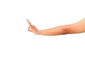 An isolated hand reaches out with a pointing finger against a white background, isolated hand gesture for concepts photo