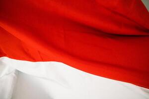 Wavy Red and White Fabric Texture Background, Perfect for Graphic Design and Presentations photo