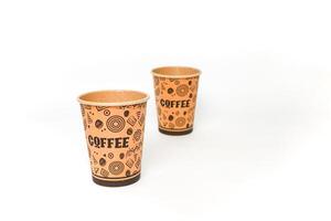 Two disposable coffee cups with coffee bean pattern, on a clean white background, perfect for a quick caffeine fix photo