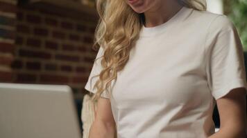 Happy Caucasian woman business girl working online laptop writing email message smiling glad typing computer freelancer worker businesswoman female chatting browsing network internet ecommerce at home video