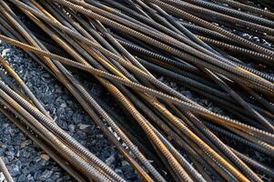 Group of steel rods. Steel rods are used in reinforced concrete and masonry structures. photo