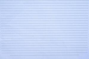 Full frame shot of blank notebook page. A book or stack of paper pages that are often ruled and used for purposes such as note-taking. photo