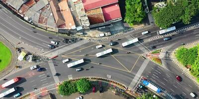 An aerial view of a busy intersection with cars and buses video
