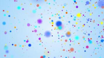 Abstract particle background with flowing colorful sphere particles on light blue gradient. This vibrant multicolored background animation is full HD and a loop. video