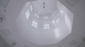High white ceiling with windows. Interesting domed ceiling with windows inside. Interior of planetarium, library. video