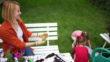 Caring for plants and enjoying creativity in the garden with kids video