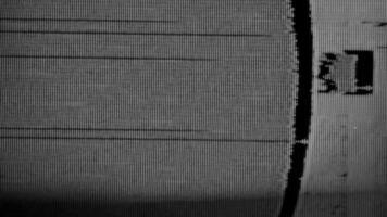 Grainy glitch effect with cinematic VHS elements and broken signal textures for. content makers or visual artists seeking an authentic analog vibe. An abstract digital composition of distorted lines video