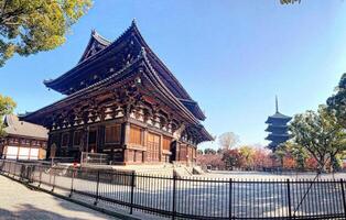 The big ancient wooden sanctuary of Toji Temple in Kyoto , Japan. To-ji temple is a UNESCO World heritage Site and houses many National Treasures and important Cultural properties of Japan. photo