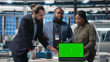 Team of consultants and factory analysts work with a copy space screen in the solar panel plant, ensuring every detail aligns with clean energy efficiency and solar tech innovation. Camera A. video