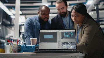Group of industry experts engineers examining solar panel systems during a production inspection, ensuring engineering accuracy, quality control and factory operations efficiency. Camera B. video