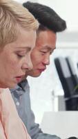 Dynamic business team brainstorming innovative ideas in a modern office video