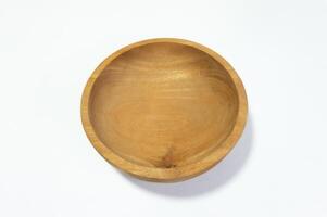 Elegant minimalist wooden bowl studio shot capturing its natural texture photo