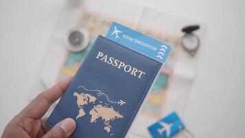 Preparing for travel with essential documents and maps video
