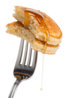Pancakes with syrup on fork isolated on transparent background, breakfast food close-up, dripping maple syrup png