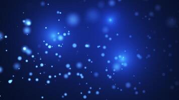 Dark blue abstract background with particles and points of light creating beautiful bokeh. Seamless looped 4k . video