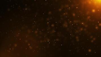Abstract golden particles animation concept for birthday and holiday celebration. 4k bokeh effect background with light dust particles falling like rain on dark background. Animation footage video