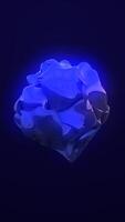 Glowing blue organic abstract 3D shape floating in dark space with illuminated surface reflections video