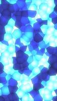 Geometric glowing blue cells in a mosaic-like structure, emitting cool digital light in a futuristic crystalline abstract pattern video
