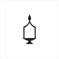 A black and white icon of a candle on a table vector