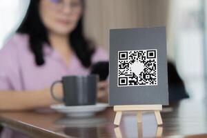 QR code to pay for service in cafe. Scanning get discounts. E wallet, technology, online payment, banking app photo