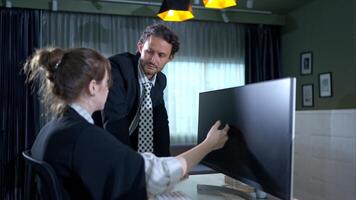 In the office, two businessmen and women discuss and exchange idea and give advice to each other to complete the work,70 photo