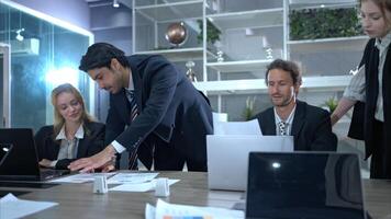 In the conference room, a group of businesspeople are discussing the follow-up meeting and the results of operations,24 photo