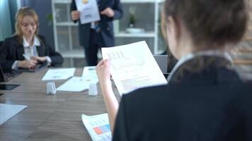 In the conference room, a group of businesspeople are discussing the follow-up meeting and the results of operations, 10 photo