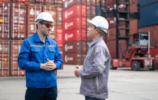 Engineers and technicians supervise and inspect the delivery of containers at container manufacturing and storage site,100 photo