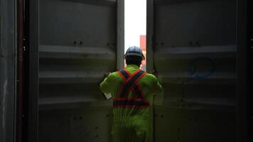 Engineers and technicians inspect the inside of containers,83 photo