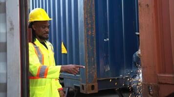 Technicians inspect container repairs by welding at container,42 photo