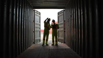Engineers and technicians inspect the inside of containers and order repairs at the container manufacturing and storage site,25 photo