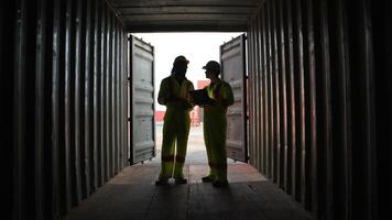 Engineers and technicians inspect the inside of containers and order repairs at the container manufacturing and storage site,12 photo