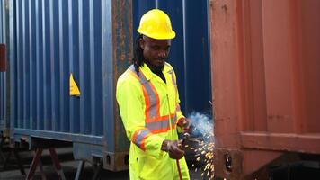 Technicians inspect container repairs by welding at container,10 photo