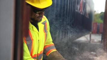Technicians inspect container repairs by welding at container,1 photo