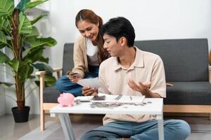 Effective Financial Communication. Couple discussing financial decisions with paperwork. photo